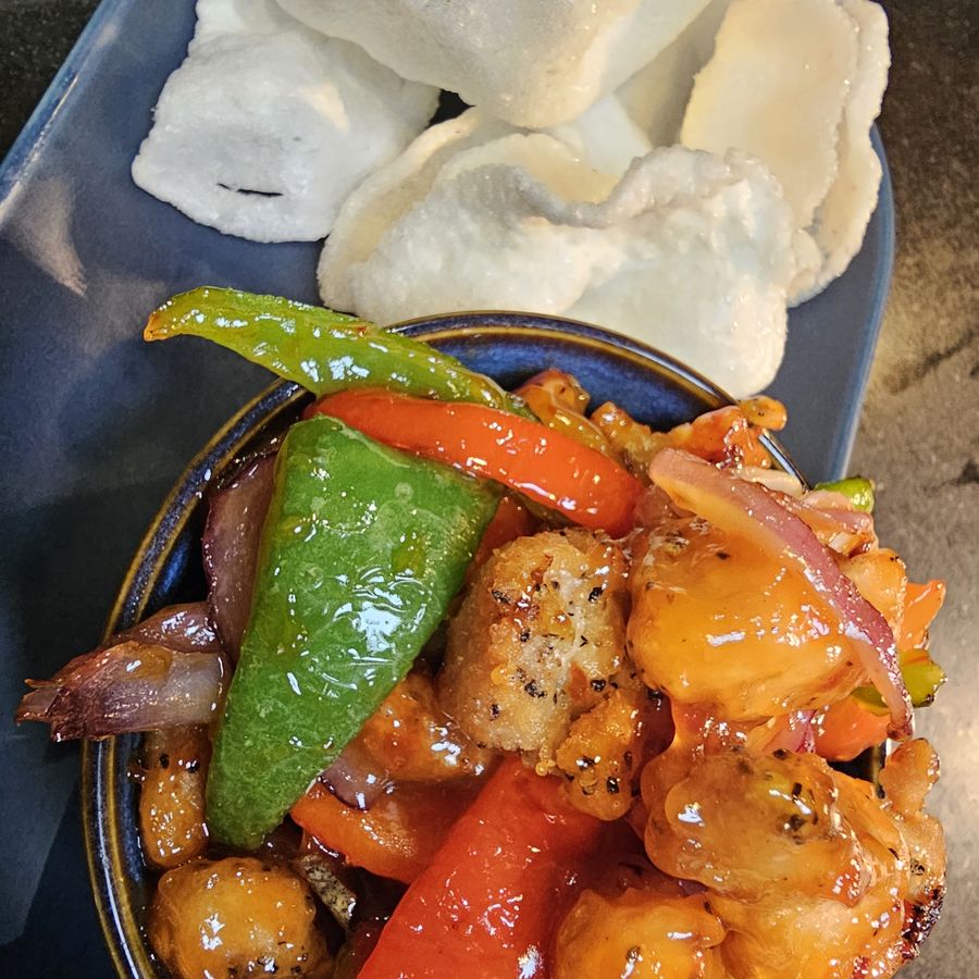 Salt and chilli chicken with prawn crackers
